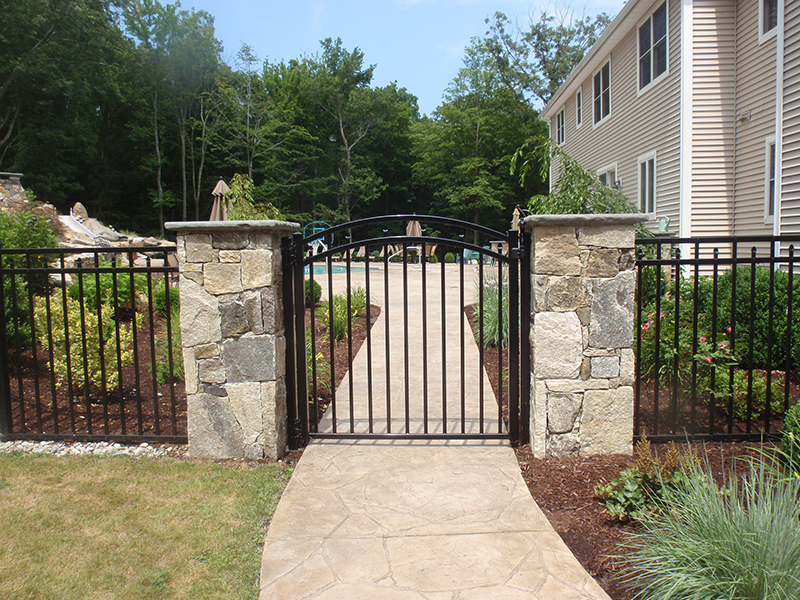 Custom masonry installation with stone features and refined outdoor detailing